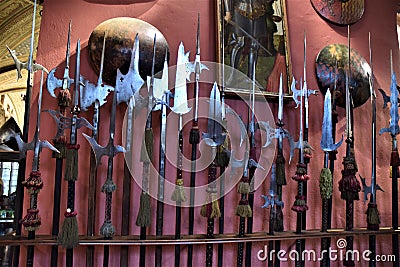 Rastrelleria, with ancient spears and halberds of various shapes and sizes, inside a room of Villa Stibbert, in Florence. Editorial Stock Photo