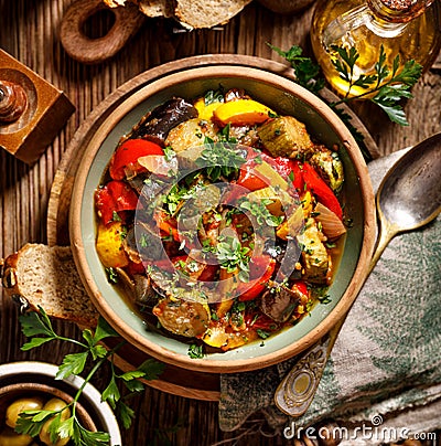 Ratatouille, Vegetarian stew made of zucchini, eggplants, peppers, onions, garlic and tomatoes with addition of aromatic herbs, to Stock Photo