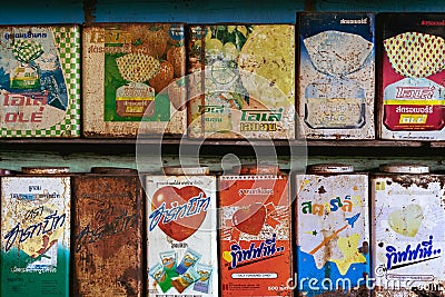 RATCHABURI, THAILAND-JANUARY 19,2020 : Collection retro and rusty vintage style colorful and various brands candy tin boxes on Editorial Stock Photo