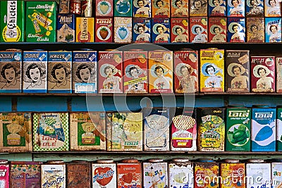 RATCHABURI, THAILAND-JANUARY 19,2020 : Collection retro and rusty vintage style colorful and various brands candy tin boxes on Editorial Stock Photo