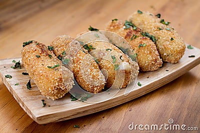 Ration of Croquettes. Typical Tapa of Spanish Cuisine. Stock Photo