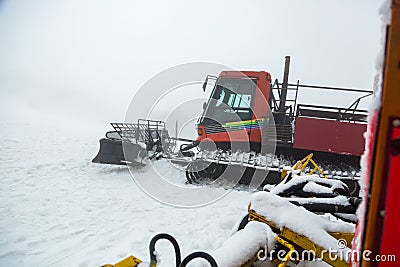 Ratrak in a winter mountain resort. Stock Photo