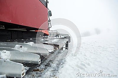 Ratrak in a winter mountain resort. Stock Photo