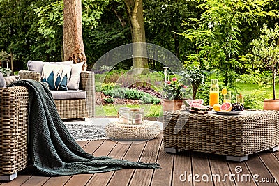 Rattan table with fruit Stock Photo