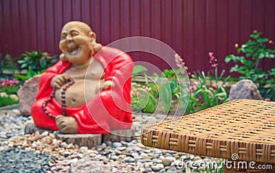 Rattan table in the garden Stock Photo