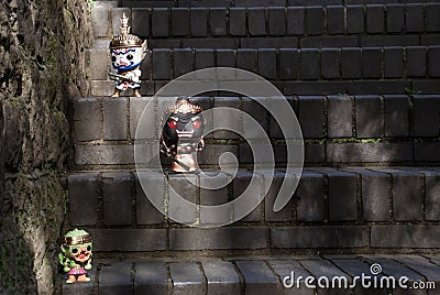 Ravana, Giantess and Hanuman. Standing on a stone stairway with light shining down Editorial Stock Photo