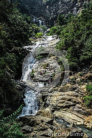 Ravana waterfall Sri Lanka. Crowded touristic spot called Ravana falls on a beautiful sunny day. Natural landmark in central Sri Editorial Stock Photo