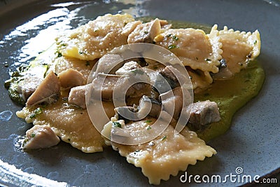 Ravioli with Genoese pesto sauce and swordfish cubes Stock Photo