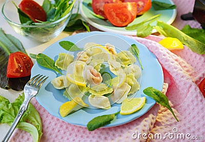 Ravioli on plate with vegetables. Food art. Healthy lifestyle. Restaurant menu. Dinner time. Food blog. Stock Photo