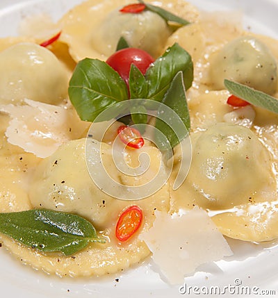 Ravioli with red chily pepper and sweet basil Stock Photo