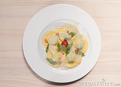 Ravioli with red chily pepper and sweet basil Stock Photo