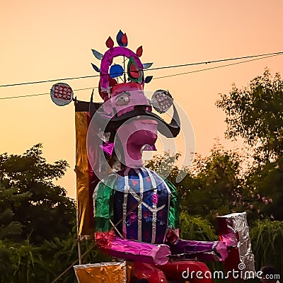 Ravnans being ignited during Dussera festival at ramleela ground in Delhi, India, Big statue of Ravana to get fire during the Fair Editorial Stock Photo