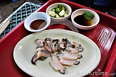 Raw abalone, sea snail on Jeju, Korea Stock Photo