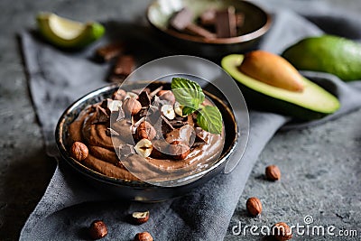 Raw avocado chocolate mousse with hazelnuts Stock Photo