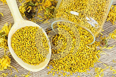 Raw bee pollen and dry calendula flower Stock Photo