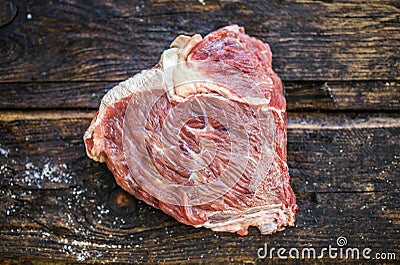 Raw beef in the form of a heart. Stock Photo