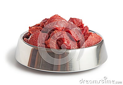 Raw beef meal in bowl, fresh, natural food for dog or cat Stock Photo