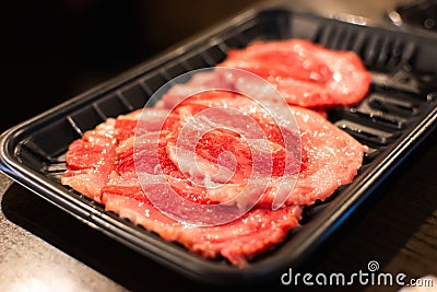 Raw beef or meat in plastic plate preparing for grilled yakiniku style Stock Photo