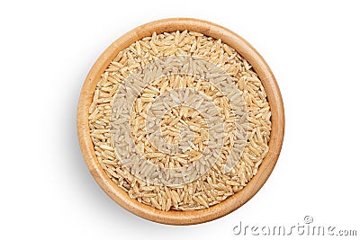 Raw brown rice heap in wooden bowl top view surface isolated on white background Stock Photo