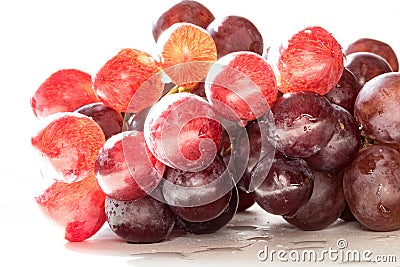 Bunch of red grapes on white Stock Photo