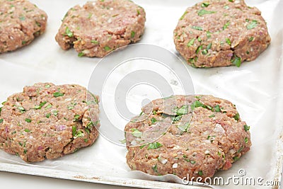 Raw burger patties Stock Photo