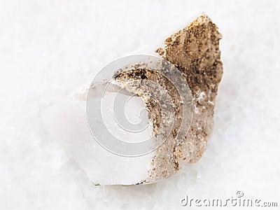 raw cacholong (white opal) stone on white Stock Photo