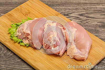 Raw chicken boneless and skinless leg Stock Photo