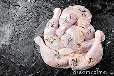 Raw chicken legs on black background Stock Photo