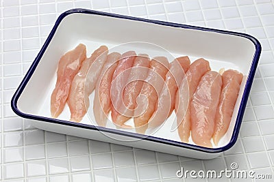 Raw chicken tenders Stock Photo