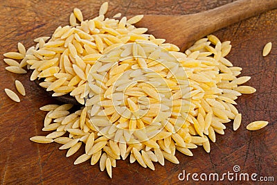 Raw durum wheat on spoon Stock Photo