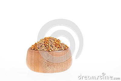 Raw fenugreek seeds - Trigonella foenum - graecum Stock Photo