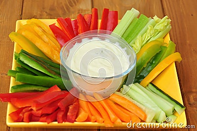 Raw food with vegetables and dip Stock Photo