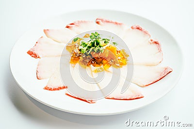Raw fresh Hamaji fish meat sashimi in white plate Stock Photo