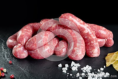 Raw and fresh meat. Fresh sausages and chicken meat ready to cook Stock Photo