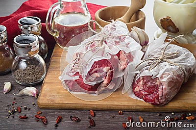 Raw fresh meat rib eye steak composition on wooden background Stock Photo