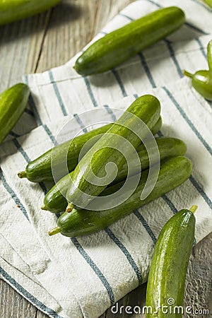 Raw Green Organic Persian Cucumbers Stock Photo