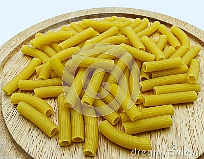 Raw italian Sedani Rigati. Italian maccheroni pasta specialty. Stock Photo