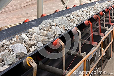 Raw Material on Conveyor Belt before being Crushed at Copper Mine Stock Photo