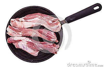 Raw meat in a frying pan Stock Photo