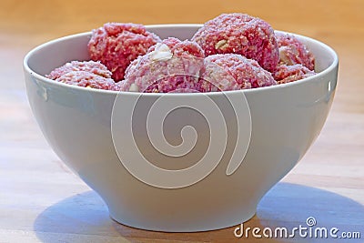 Raw meatballs in a bowl Stock Photo