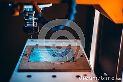 Raw metal detail fixed in CNC milling machine Stock Photo