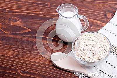 Raw oatmeal diet food on board Stock Photo