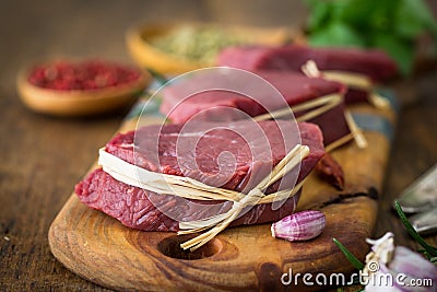 Raw organic beef steak with spices Stock Photo