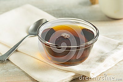 Raw Organic Dark Agave Syrup Stock Photo