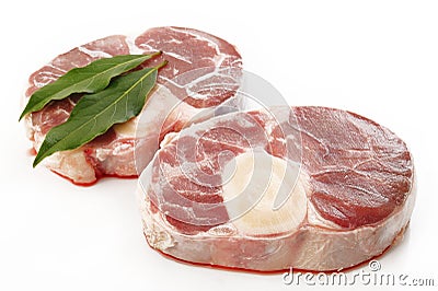 Raw oxtail with bay leaf Stock Photo
