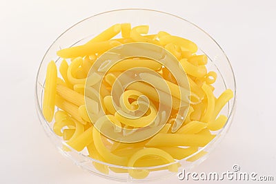 Raw pasta in a bowl Stock Photo