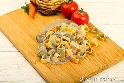 Raw pasta hearts hape Stock Photo