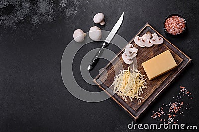 Raw pasta, mushrooms, onions, mince, spices and herbs to make a delicious paste Stock Photo