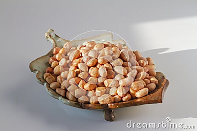 Raw peanut kernel on a white background Stock Photo