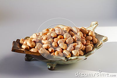Raw peanut kernel on a white background Stock Photo